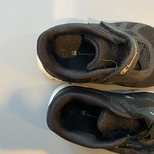 Champion sneakers size baby/toddler 4. Used and a little dirty.